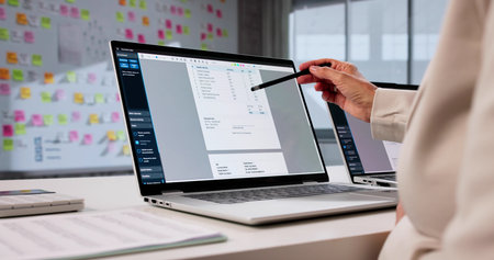 Senior Accountant Manages Tax Statements On Laptop Computer In City.