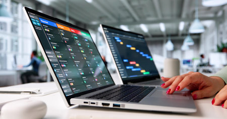 Female Executive Organizing Projects On Kanban Board At Computer Desk