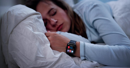 Tech-Savvy Nurse Tracks Patients' Sleeping Patterns Using Smartwatch Appの写真素材