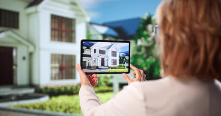 Virtual Real Estate House Video Conference Tour: A Woman Workingの写真素材