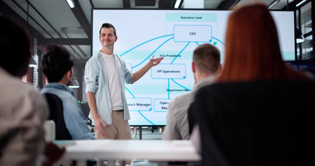 Engineering Professor Presenting Diverse Team Organizational Chart Using Touchscreen Technology.