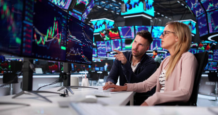 Skilled Broker Using Multiple Monitors For Stock Market Trading Success