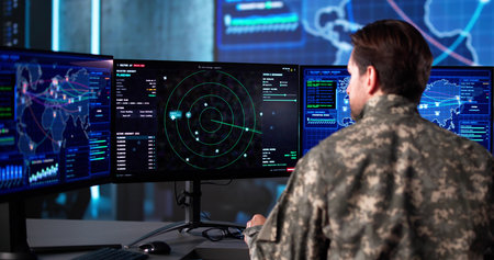 Senior Army Officer Analyzing Aerial Surveillance Data In Command Center