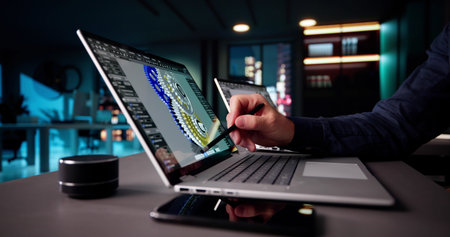 Elderly Engineer Developing 3D CAD Model Of Mechanical Part On Laptop.