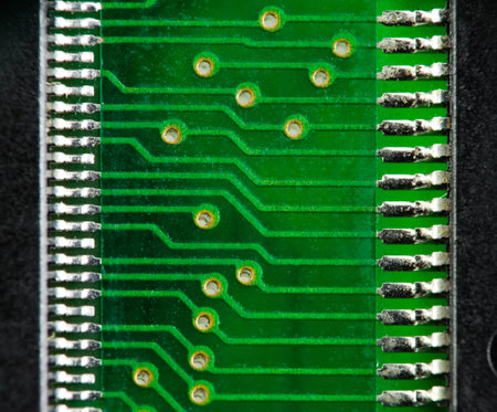 Green computer board with chips and components. 4