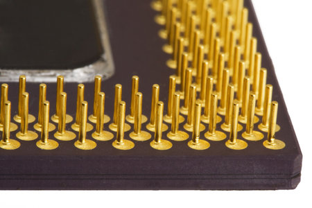 Processor. Pins and core. Close-up. Isolated. Over whiteの写真素材