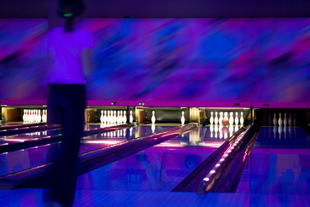 Strike in bowling. Nice shoot. Ultraviolet illuminationの写真素材