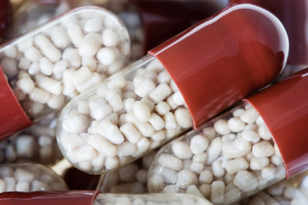 Pills. Macro. Isolated over white. Pharmacy drugs