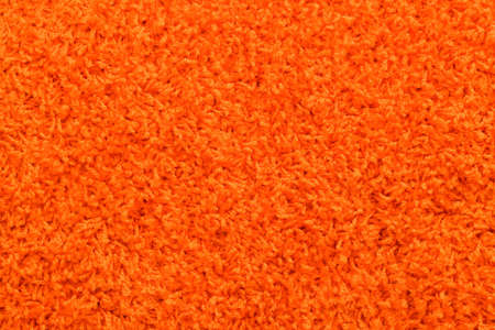 Orange wool carpet texture. Abstract background. Macro.の写真素材