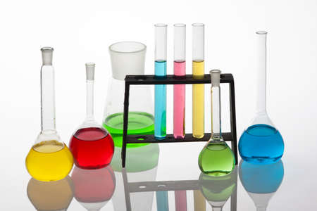 Chemisty set, with  test tubes and beakers filled with multicoloured liquids の写真素材