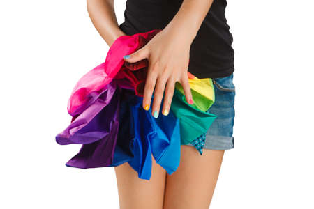 young woman opened colorful umbrella isolated on white backgroundの写真素材