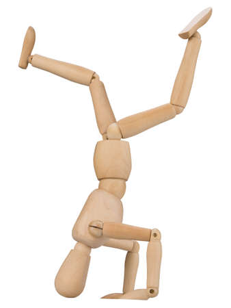 puppet in handstand, isolated on white background.の写真素材