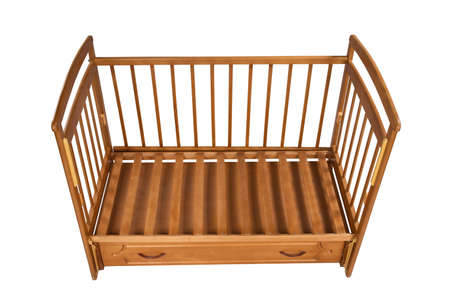 empty wooden cot without mattress isolated on white background