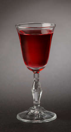 a glass of red wineの写真素材