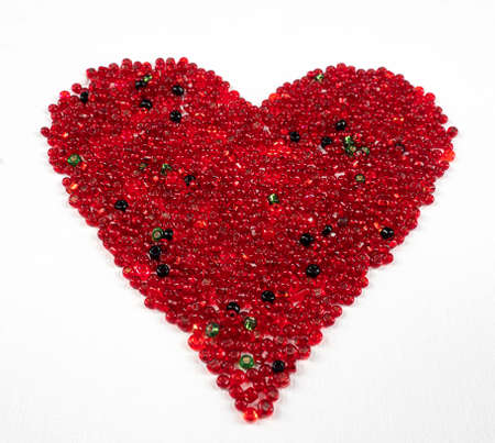 beaded heart on white backgroundの写真素材
