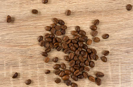 coffee beans on wooden background