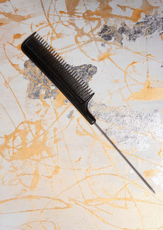 hairdressing combs. on a colored background