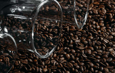 Transparent cups on coffee beans. Beautiful layout.の写真素材