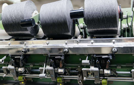 Moment of production of textile threads in the workshop,