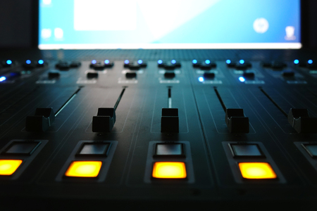 The audio mixer in the Studio, the handles move up and down, all ready to record.の写真素材