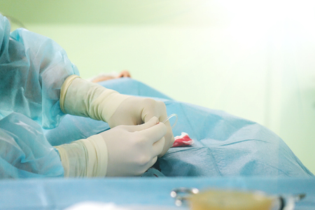 The hands of a surgeon. Medical surgery.の写真素材