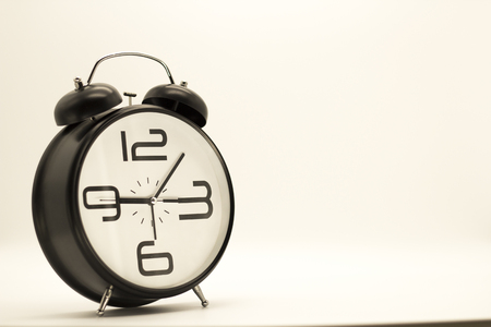 alarm clock on white background. hoursの写真素材