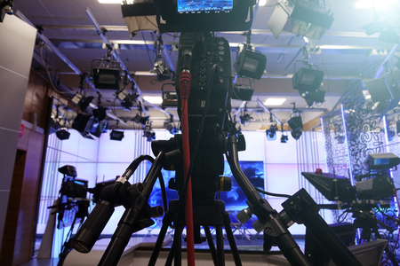 Video camera - recording show in TV studio - focus on cameraの写真素材