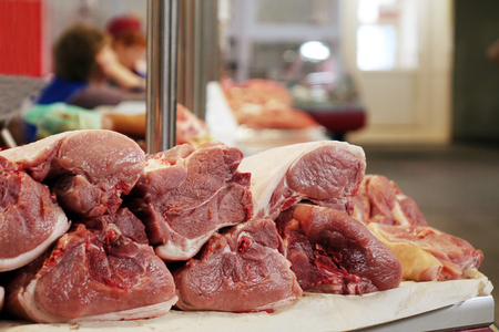 Pieces of fresh beef and pork are on the market. junk foodの写真素材