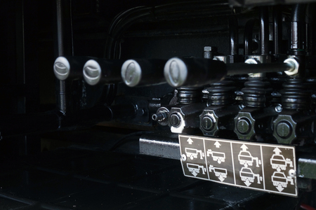 Levers on the control panel of the lifting mechanism. hydraulicの写真素材