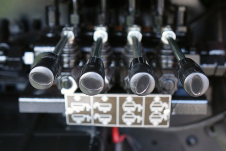 Levers on the control panel of the lifting mechanism. hydraulicの写真素材