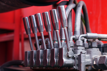 Levers on the control panel of the lifting mechanism. hydraulicの写真素材