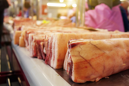 Pieces of fresh beef and pork are on the market. junk foodの写真素材