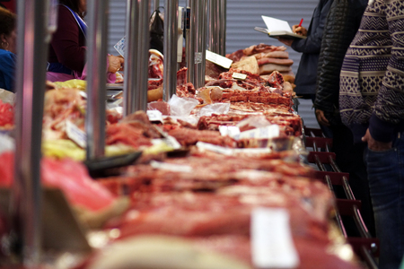 Pieces of fresh beef and pork are on the market.の写真素材