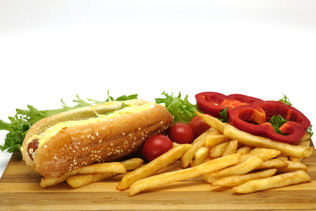Hot dogs and French fries on white background.の写真素材