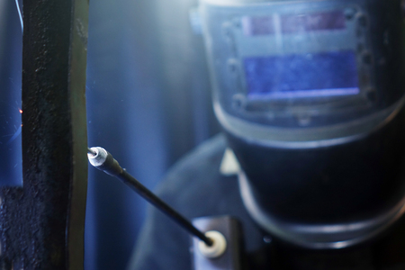 Welders working at the factory made metal. factoryの写真素材