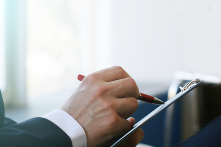 The hand of a young businessman, signing a business contract, close-up .Contract.の写真素材