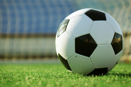 Football on a green field . Sportの写真素材