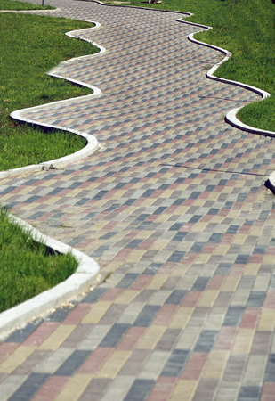 Colorful cobblestone road pavement . textureの写真素材