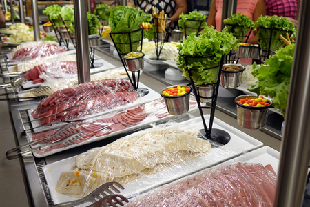 Mixed sausage appetizers on the buffet.gastronomyの写真素材