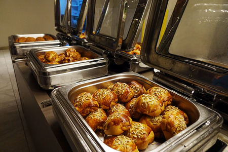 Rolls on the buffet. the range of pastries. container, cuisineの写真素材
