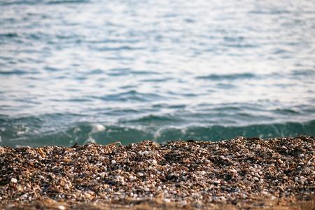 Pebble beach and blue sky on background.sea, rockの写真素材