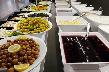 Olives and sauces on the buffet. assortmentの写真素材