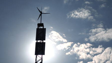 Solar panel and wind turbine on the sky background .energyの写真素材