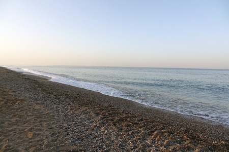 Pebble beach and blue sky on background.sea, rockの写真素材