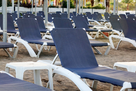 Sun loungers with umbrella on the beach. Tourism industry. relaxationの写真素材