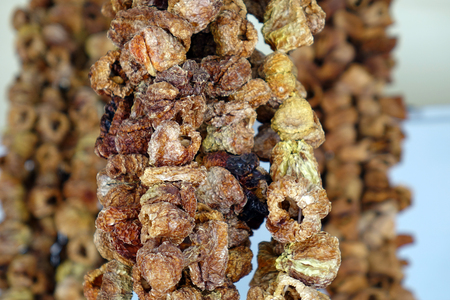 Dried spices hanging on the market, dried chili. Dried fruits.の写真素材