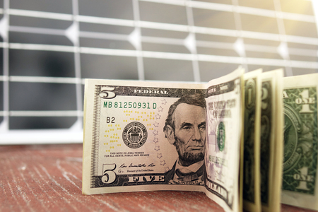 Saving American money on renewable energy and solar panels. savingsの写真素材