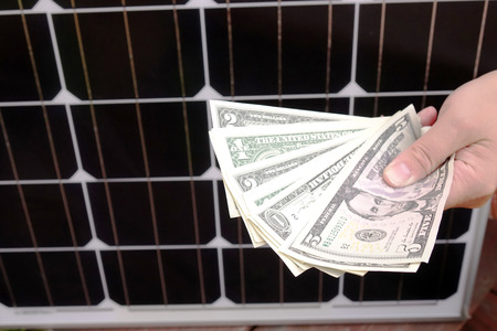 Saving American money on renewable energy and solar panels. savingsの写真素材