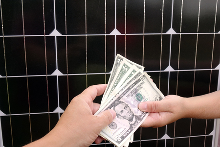 Saving American money on renewable energy and solar panels. savingsの写真素材