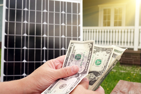 Saving American money on renewable energy and solar panels. savingsの写真素材